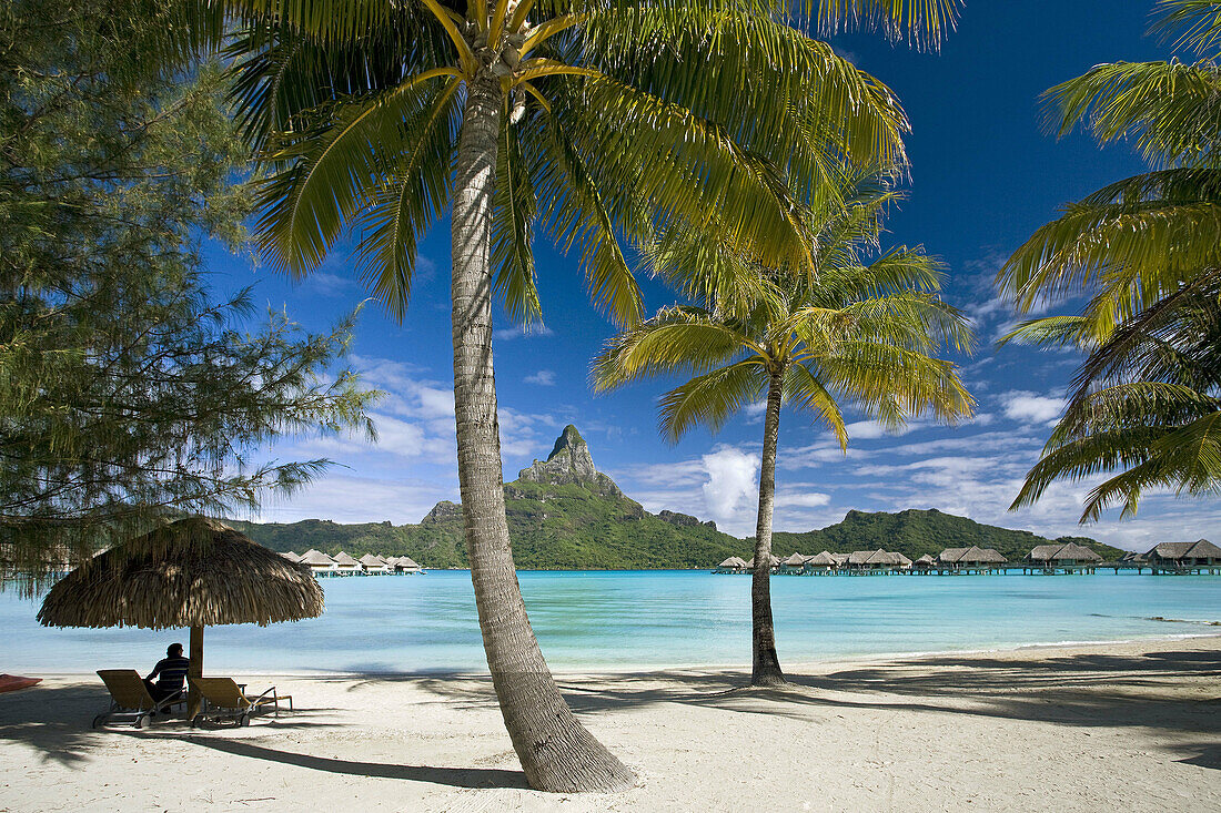 Huts, Lagoon and Mount Pahia, Bora Bora island, Society Islands, French Polynesia (May 2009)