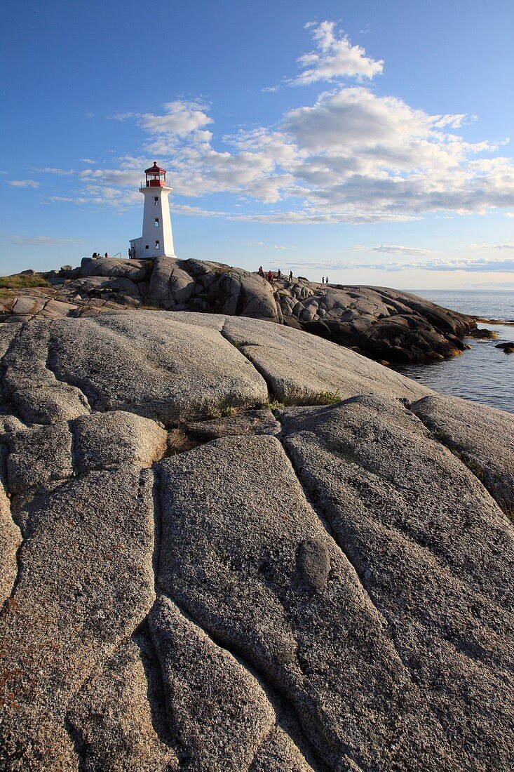 rocky coast at Peggy's Cove Ligthhouse at Peggys Cove Fishing village, St Margarets Bay, Lighthouse Route, Highway 333, Nova Scotia, Canada, North America.