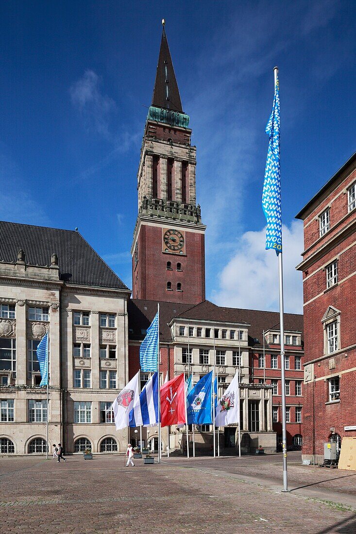 Germany, Kiel, Kiel Fjord, Baltic Sea, Schleswig-Holstein, city hall, city hall tower, campanile, brick building, Rathaus Square, flags