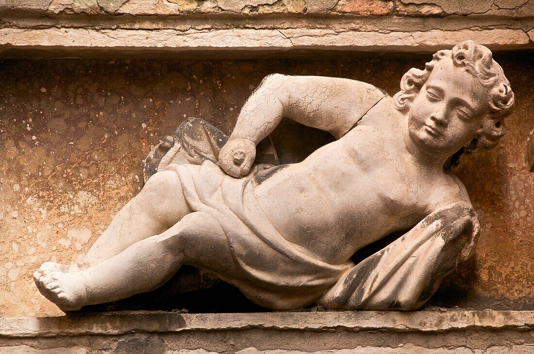 Angel lying, outside, Sculpture, Venice, Italy