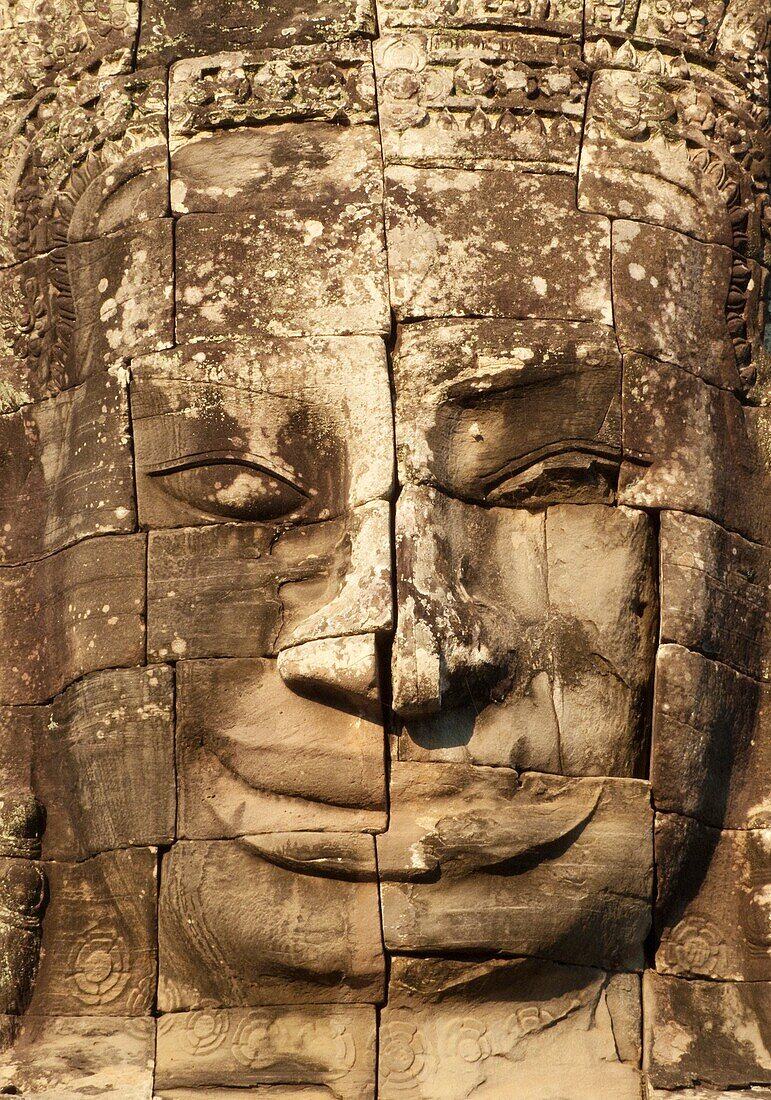 Cambodia - The face of LokeshvaraLord of the World,  in the Bayon, a temple in the centre of Angkor Thom, theGreat Capital,  of the Khmer empire in Angkor The temple complexes of Angkorcity,  were the heart of the Khmer empire which flourished from th