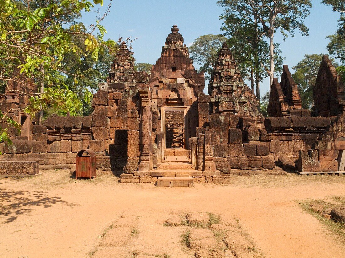 Cambodia - Gopura entrance pavilion to the temple enclosure walls of the second enclosure at the temple of Banteay Srei, which is known for the exquisite exuberance of its sandstone carvings Banteay Srei is located about 25km northeast of the main group