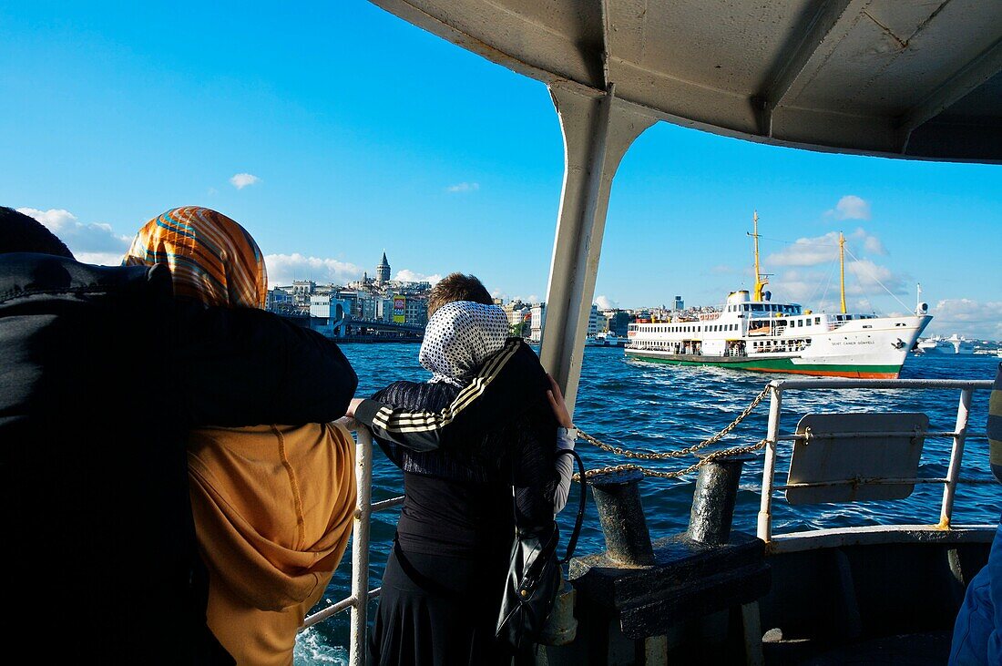 Commuters on Bosphorus ferry. Istanbul.Turkey.