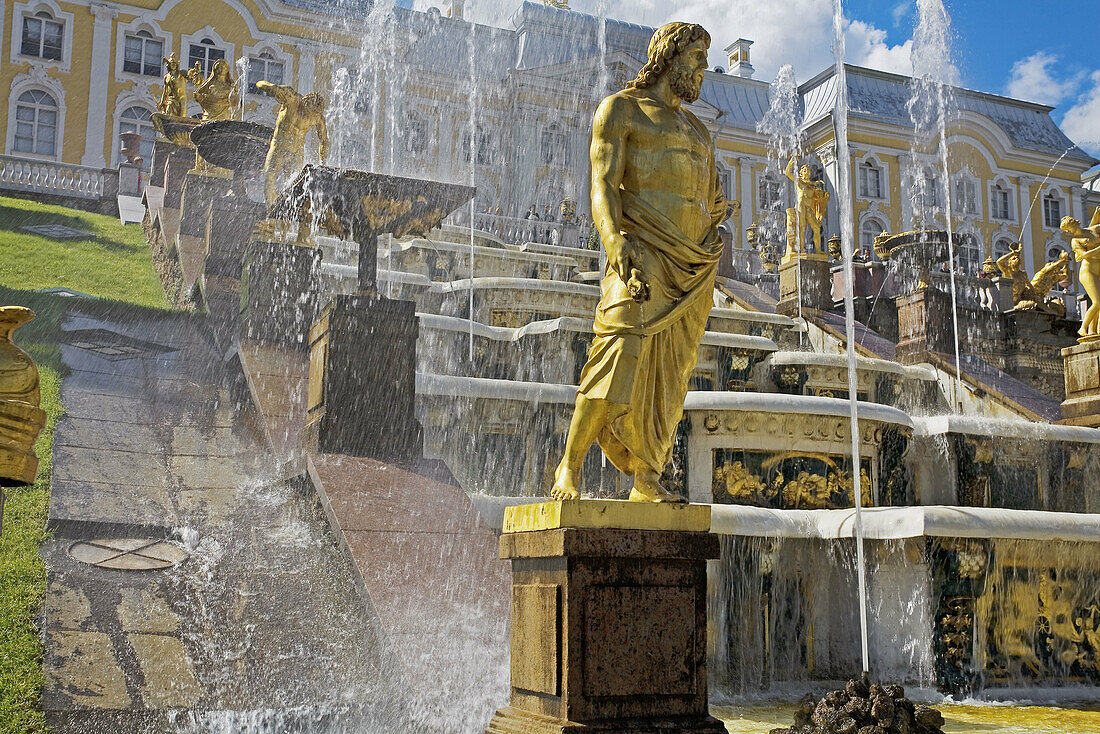 Golden statues and water works at Peterhof Park. Petrodvorets. St. Petersburg. Russia.