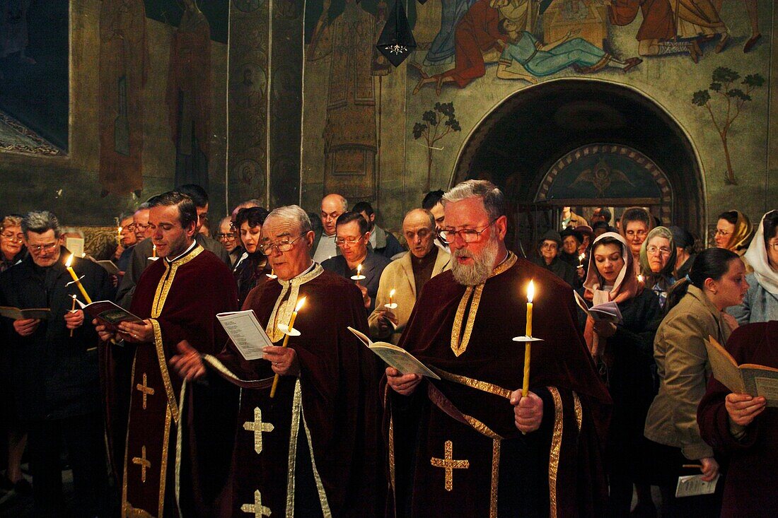 Romania, Moldavia Region, Southern Bucovina, Suceava, Easter Celebration, Candlelight mass, Easter Sunday, Orthodox Easter ceremony, St Nicholas church