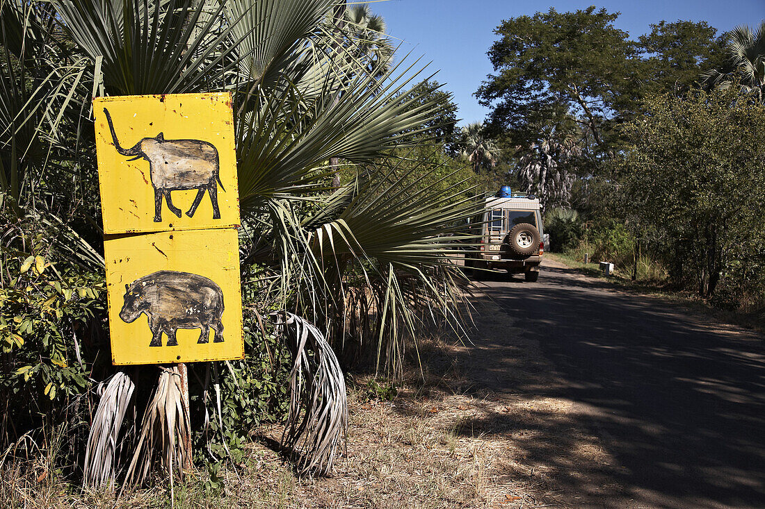 Warning sign on the roadside, Nsefu game reserve, Zambia, Africa