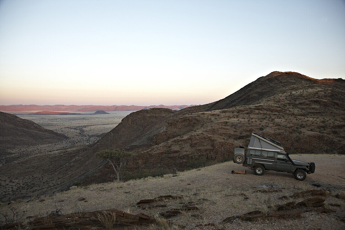 Toyota Landcruiser at Van Zyl's Pass at sunset, Namibia, Africa