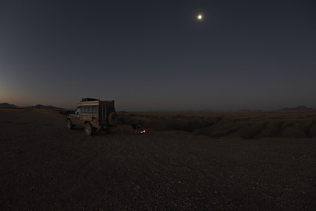 Toyota Landcruise at Kuiseb Canyon at full moon, Namibia, Africa