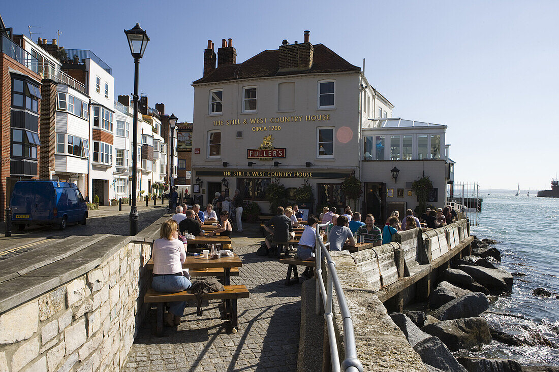 People outside The Still and West Country House Pub in Old Portsmouth, Portsmouth, Hampshire, England, Europe