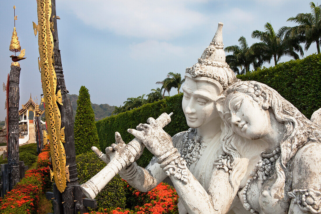 Buddhistic figures at Nong Nooch tropical botanical garden near Pattaya , Chonburi Province, Thailand, Asia