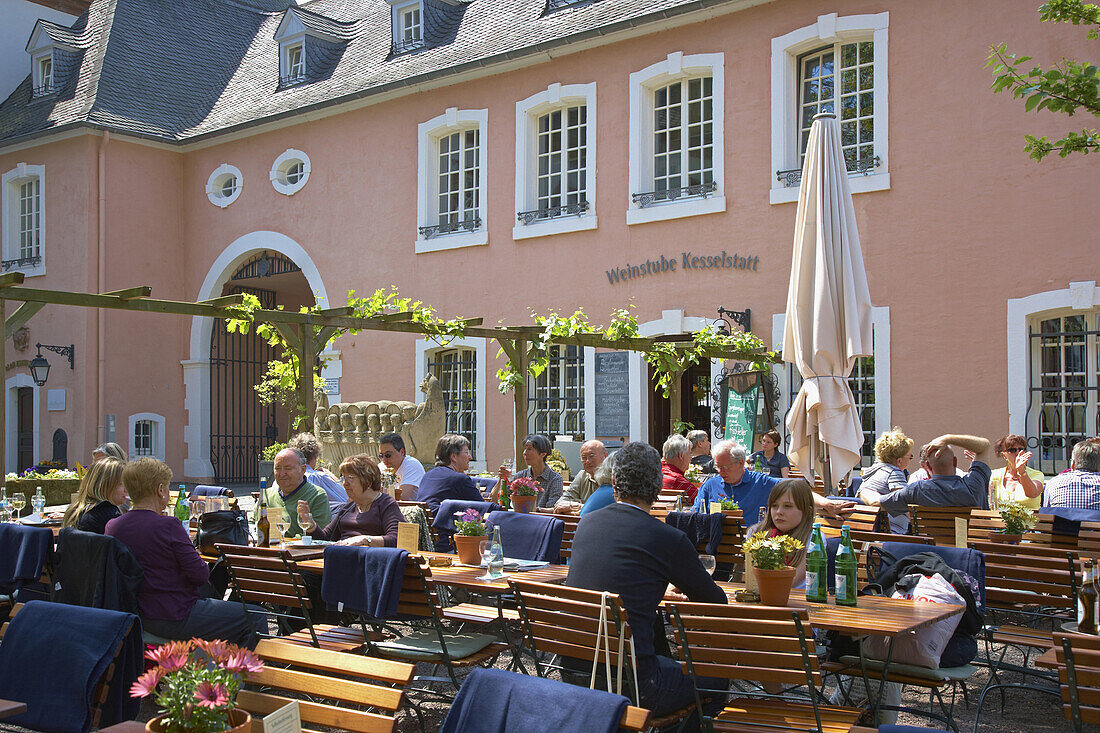 Recreation at wine tavern, Kesselstatt, Trier, Mosel, Rhineland-Palatinate, Germany, Europe