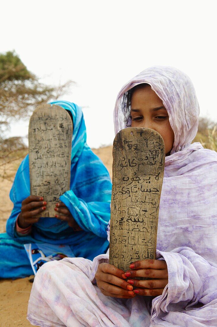 Coranic tablets, nomad family near Chinguetti, Adrar Plateau, Sahara desert, Mauritania