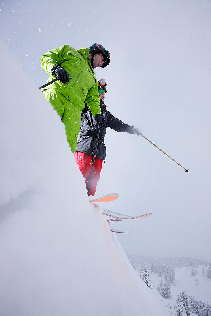 Male free skiers in deep snow, Mayrhofen, Ziller river valley, Tyrol, Austria