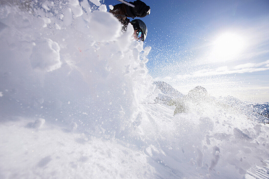 Skiers downhill skiing at Blackcomb Peak, British Columbia, Canada