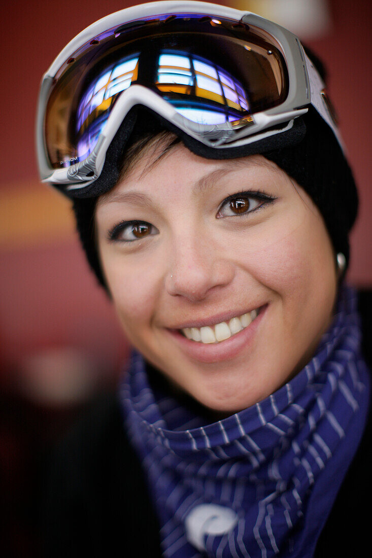 Female free skier smiling at camera, British Columbia, Canada