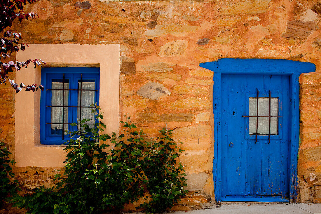 House with painted blue door, Murias de Rechivaldo, near Astorga, Camino Frances, Way of St. James, Camino de Santiago, pilgrims way, UNESCO World Heritage, European Cultural Route, province of Leon, Old Castile, Castile-Leon, Castilla y Leon, Northern Sp