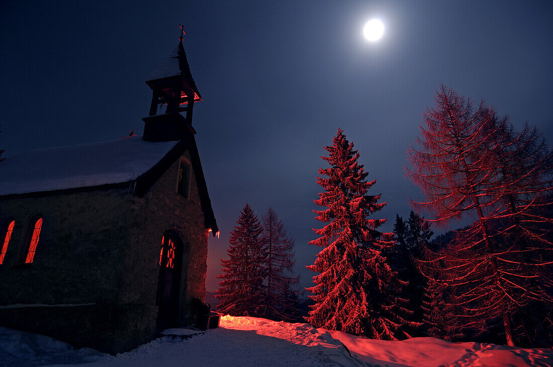 St. Anna chapel in the snow at full moon, Hemmersuppenalm, Reit im Winkl, Chiemgau, Upper Bavaria, Bavaria, Germany, Europe