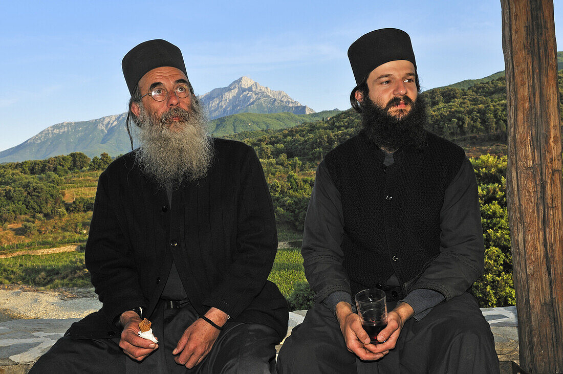 Monks near Moni Mylopotamos, Athos mountain, Chalkidiki, Greece