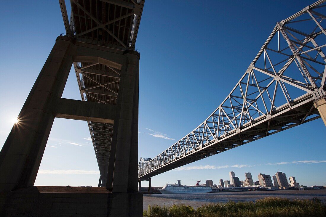 USA, Louisiana, New Orleans, skyline from the Greater New Orleans Bridge and Mississippi River, late afternoon