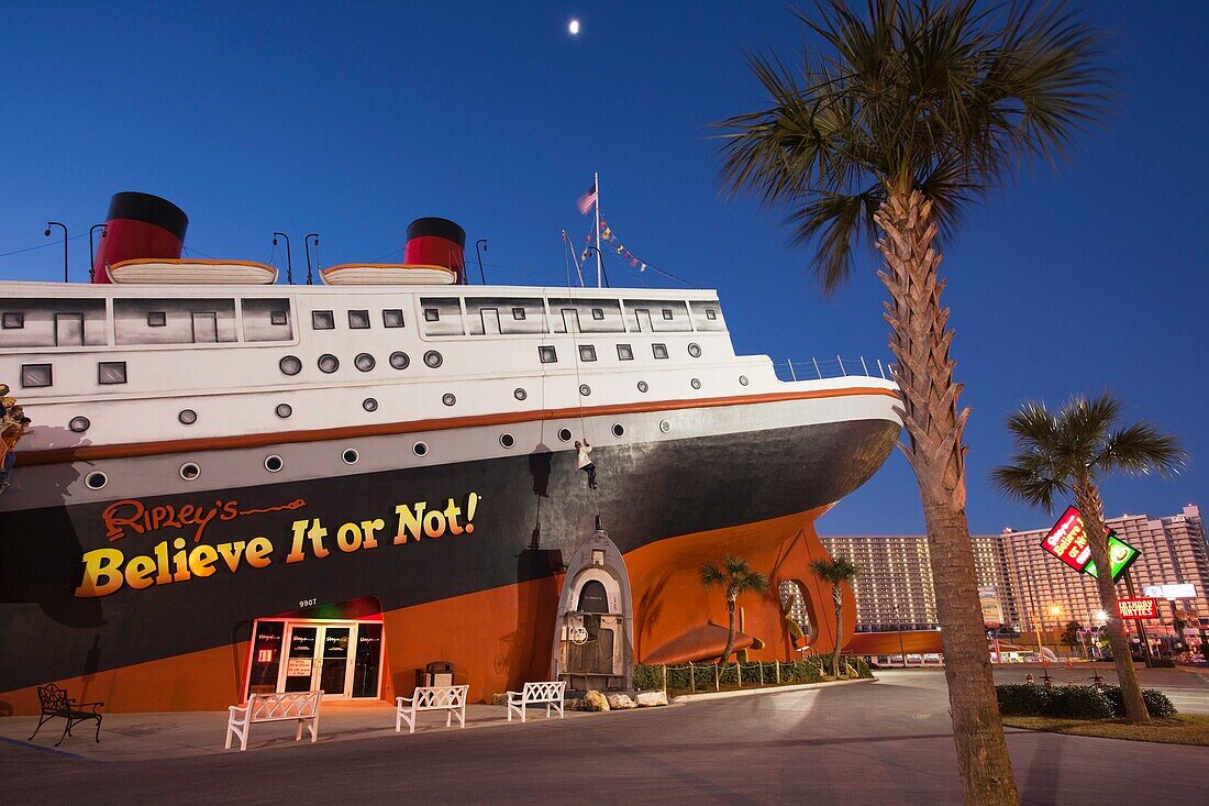 USA, Florida, Florida Panhandle, Panama City Beach, sinking ship motif of the Ripley's Believe it or Not Museum, dawn