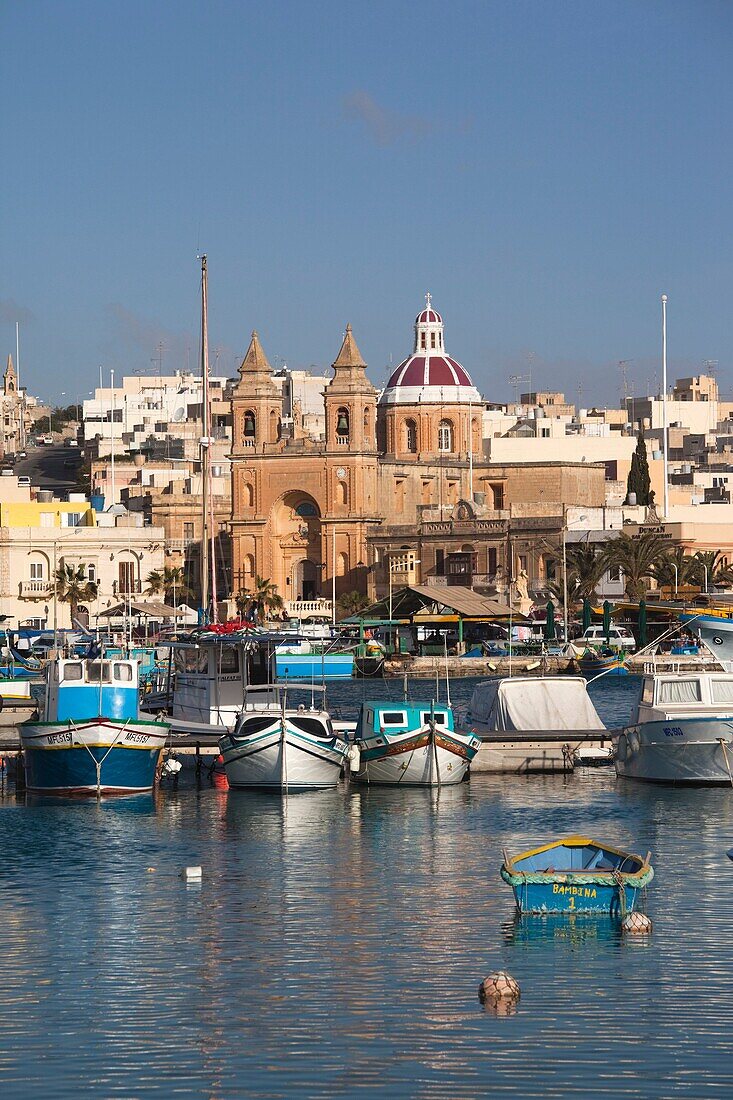 Malta, Southeast, Marsaxlokk, harbor and traditional Luzzu fishing boats