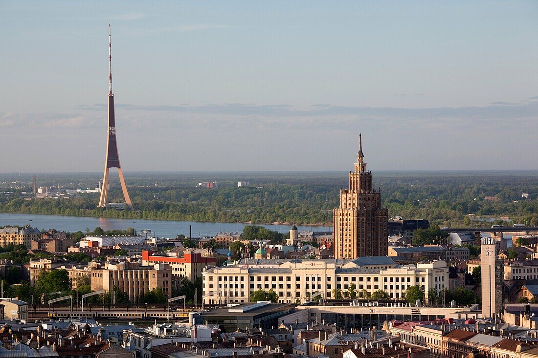 Latvia, Riga, elevated view of Old Riga, Academy of Sciences building, and TV Tower, morning