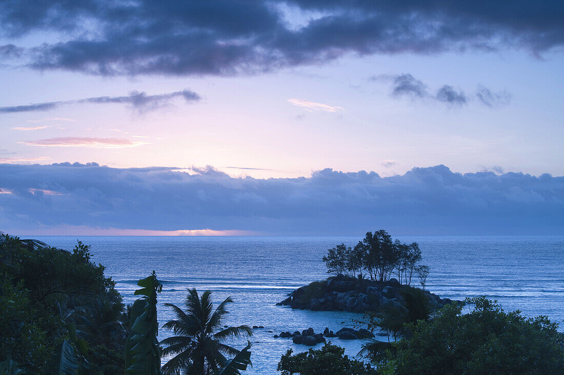 Sunrise over Fairyland Beach, Mahe island, Seychelles