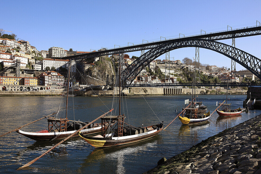 Rabelos Port wine carring barges, Douro river and Dom Luis I Bridge, Porto, Portugal
