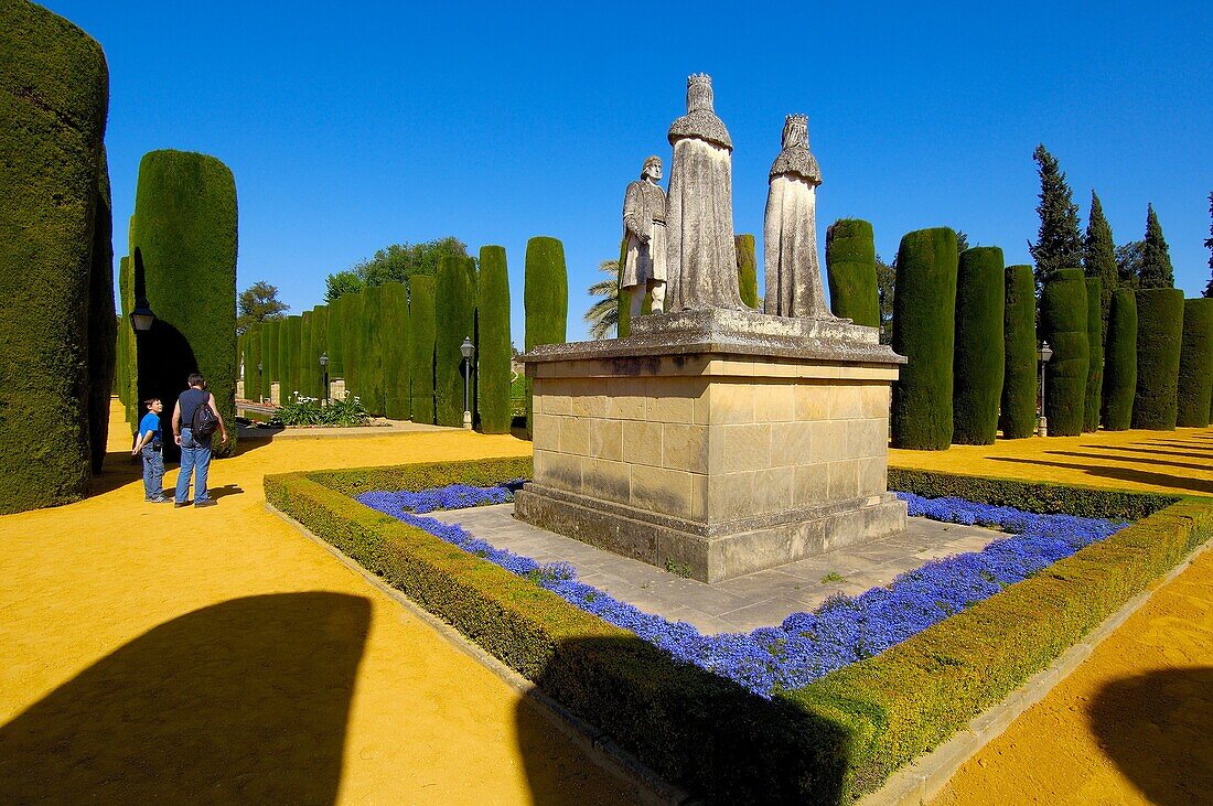 Statues of the Catholic Monarchs (Queen Isabella I of Castile and King Ferdinand II of Aragon) and Christopher Columbus in the Alcazar of the Christian Kings gardens, Cordoba. Andalusia, Spain