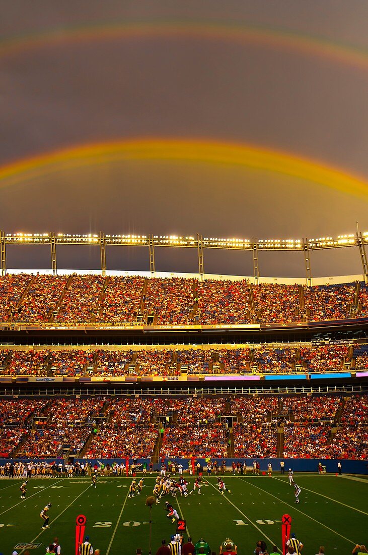 A rainbow over the stadium, Denver Broncos vs. Pittsburgh Steelers NFL football game, Invesco Field at Mile High (stadium), Denver, Colorado USA