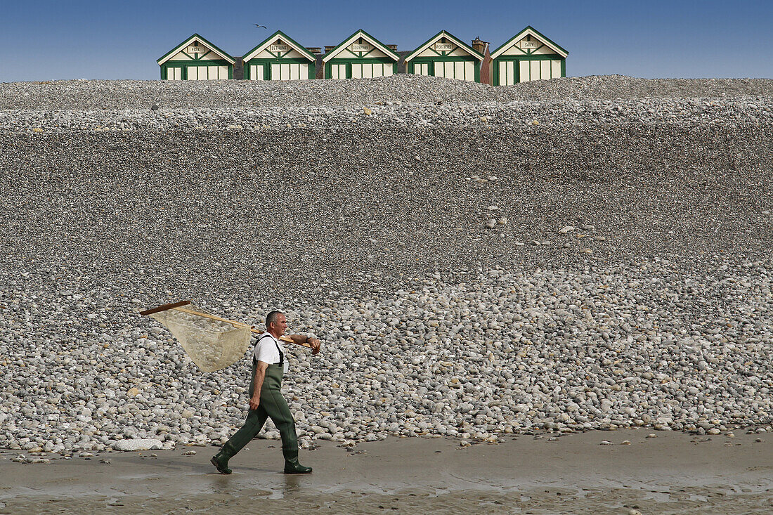 Fisherman Walking On The Beach Of Cayeux-Sur-Mer, Bay Of Somme (80), France
