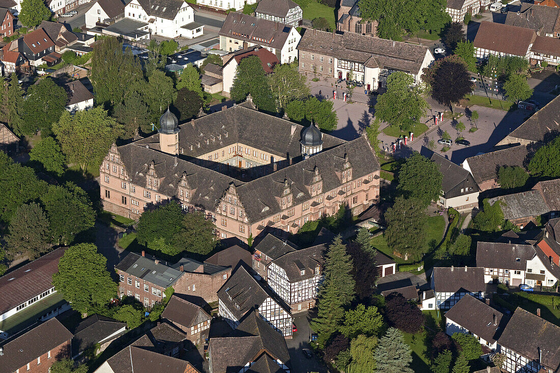 aerial of Bevern castle, half-timbered houses, Lower Saxony, Germany