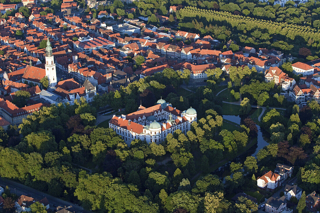 Aerial view of Celle castle and gardens, red roofs of the old town, church and Celle avenue of trees in the French garden, Celle, Lower Saxony, Germany