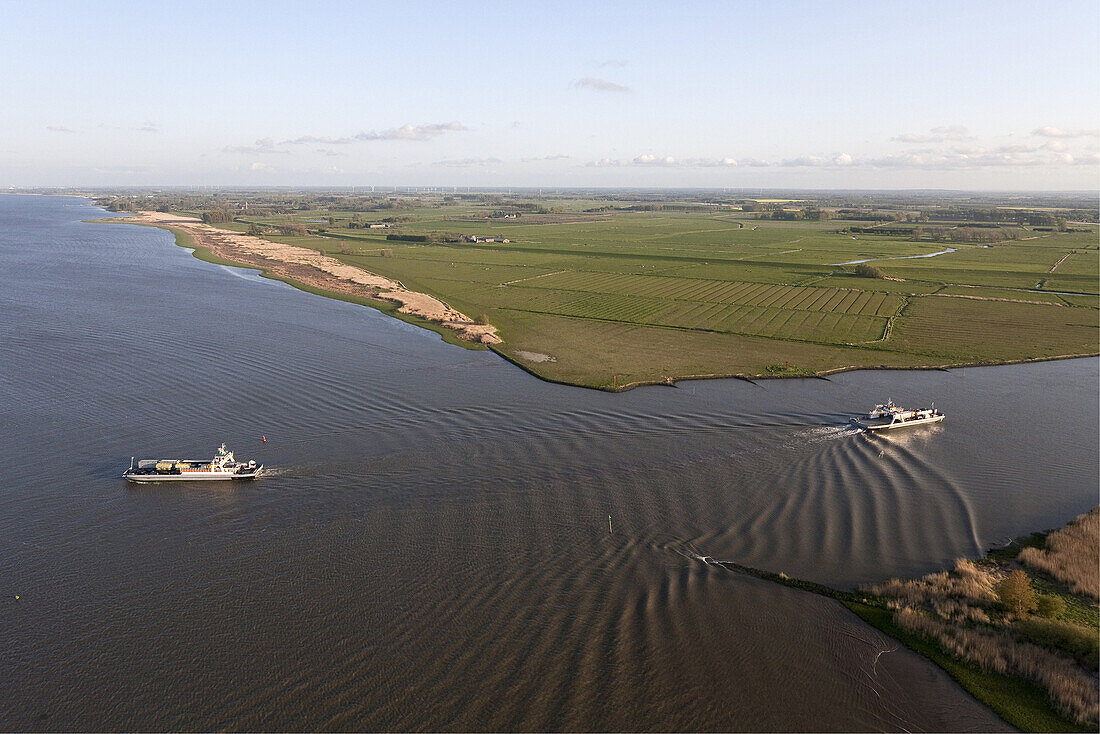 Aerial of a car ferry at the junction of the Süderelbe at Wischhafen and the Lower elbe, Lower Saxony, Germany