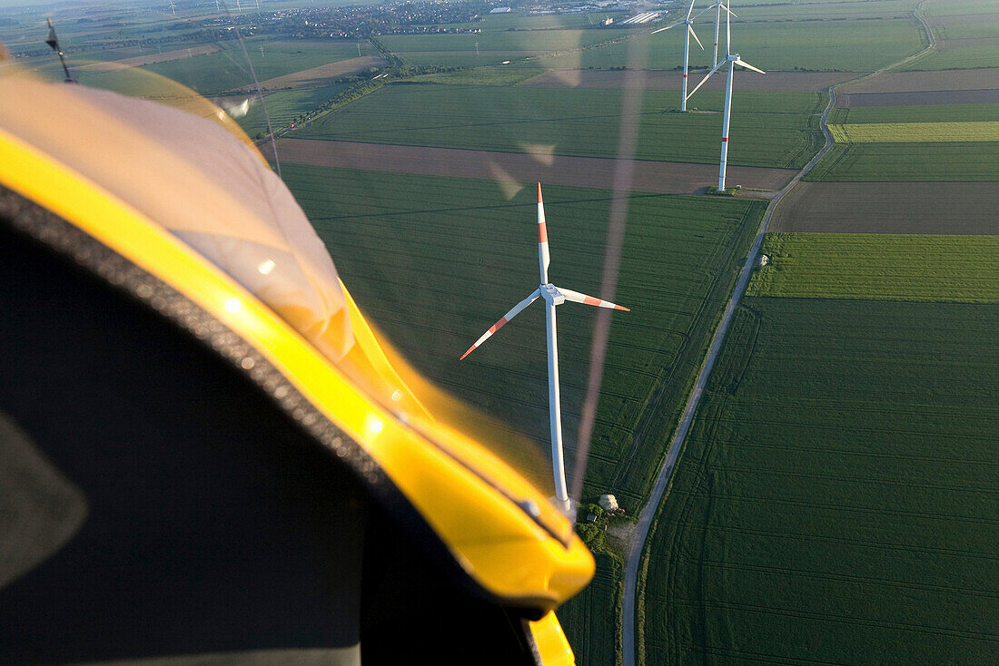 Gyrocopter above wind park, Lower Saxony, Germany