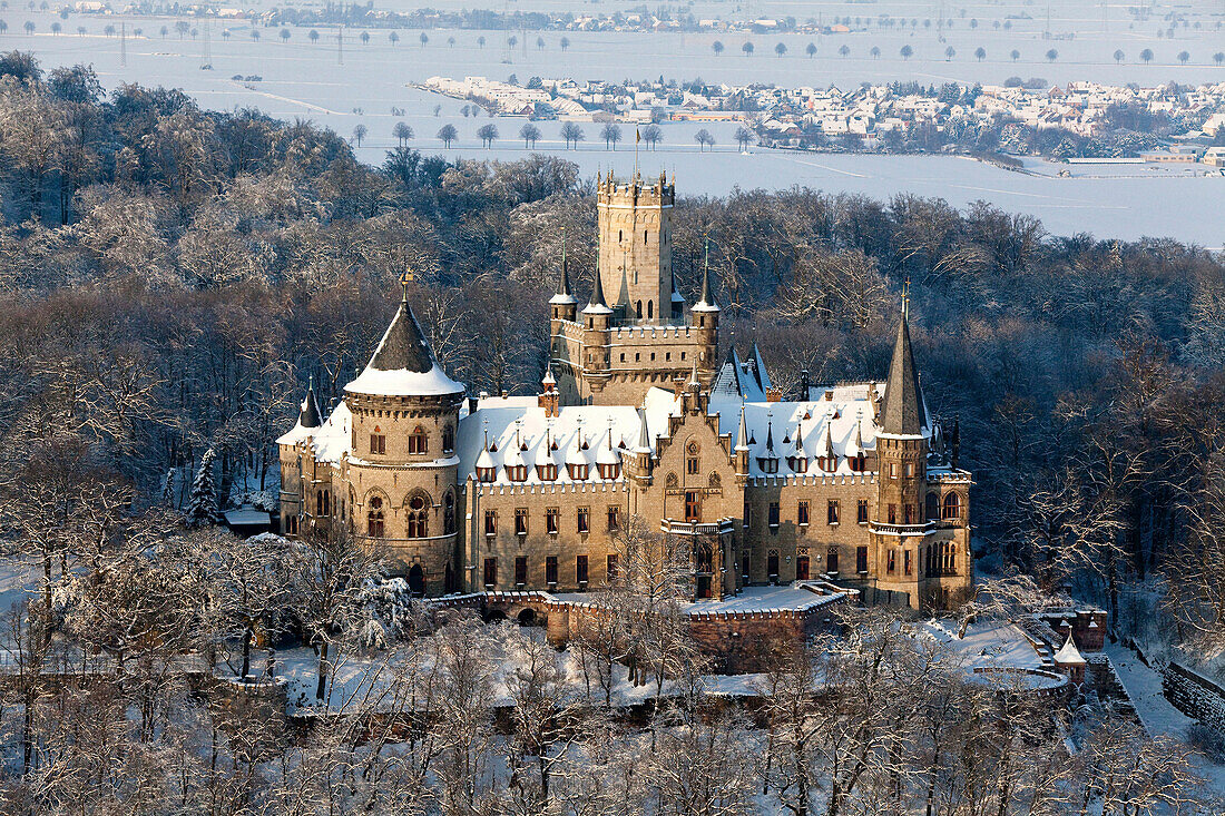 Aerial shot of Marienburg castle in winter, Schulenburg, Pattensen, Lower Saxony, Germany