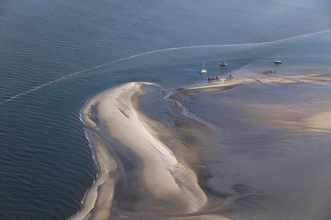 Aerial of yachts anchored on a sandbank, Wadden Sea, Lower Saxony, Germany