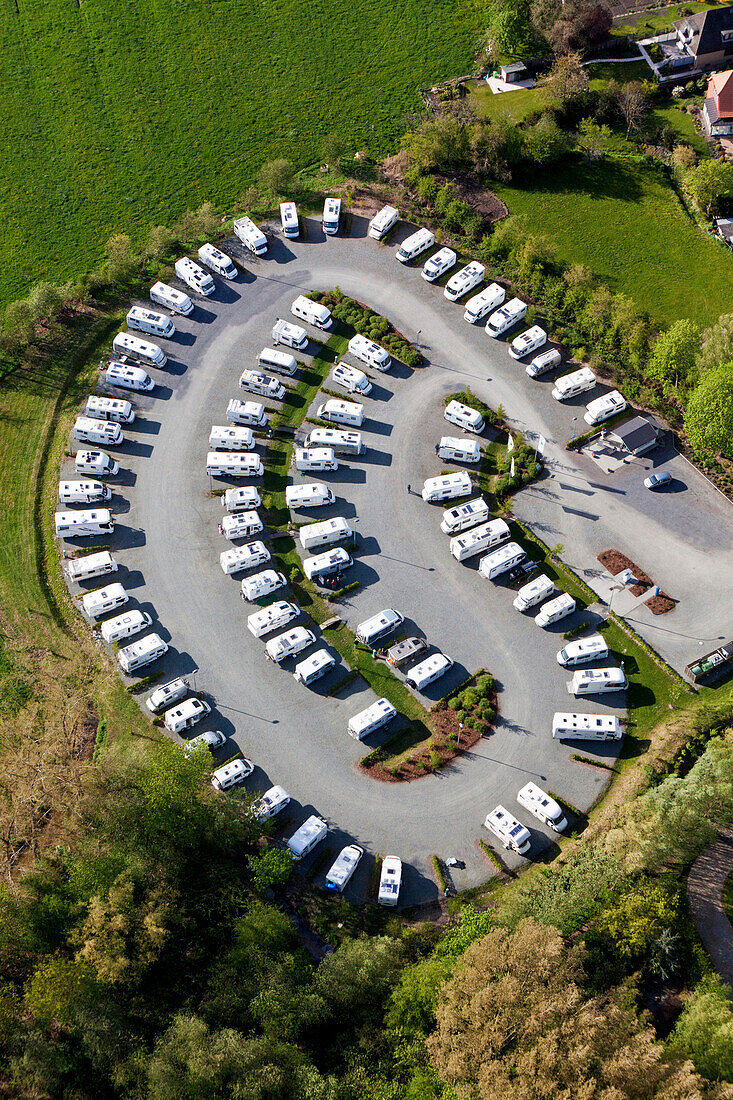 aerial of parking space for campervans, white campers, Germany