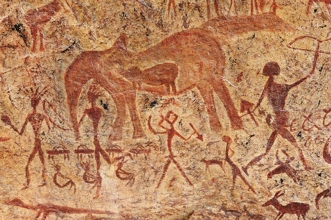 Reconstruction of prehistoric petrograph with bushmen, gazelles and pregnant elephant, Bull´s Party, Ameib, Erongo mountains, Namibia