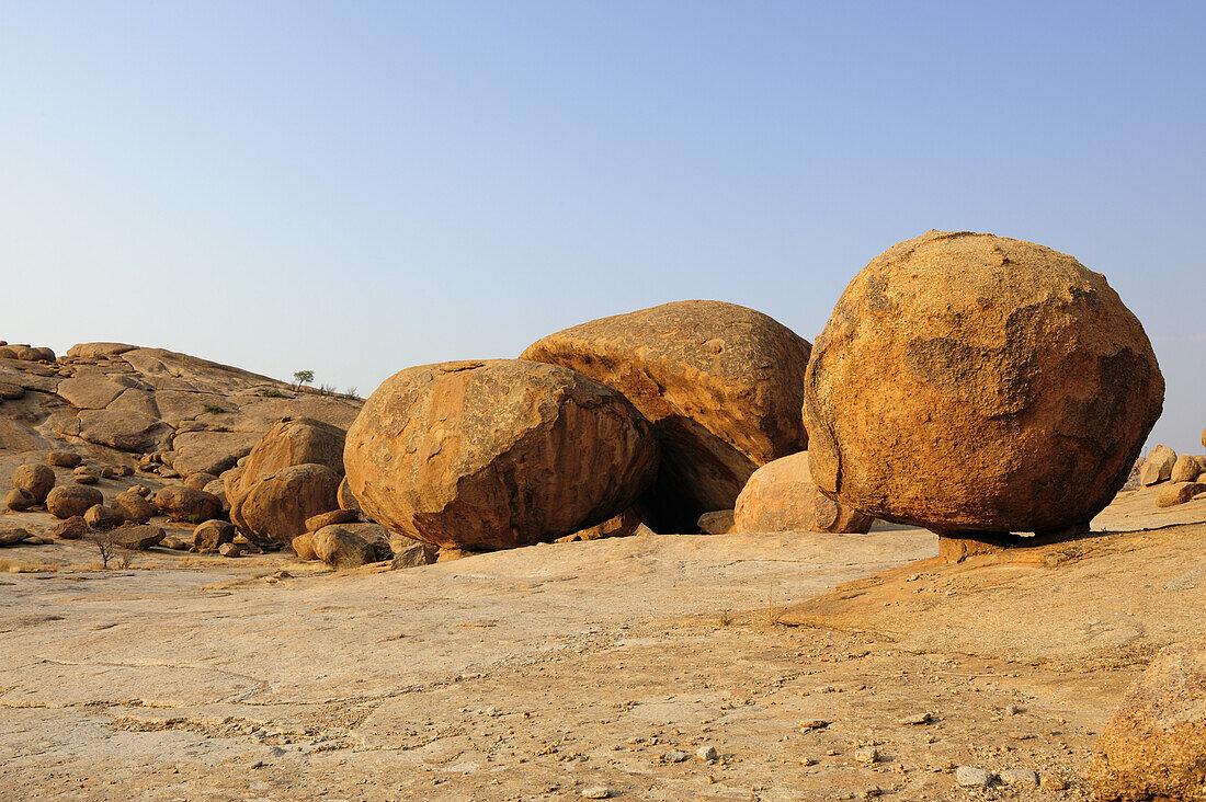 Balancing granite rock laying on slab, Bull´s Party, Ameib, Erongo mountains, Namibia