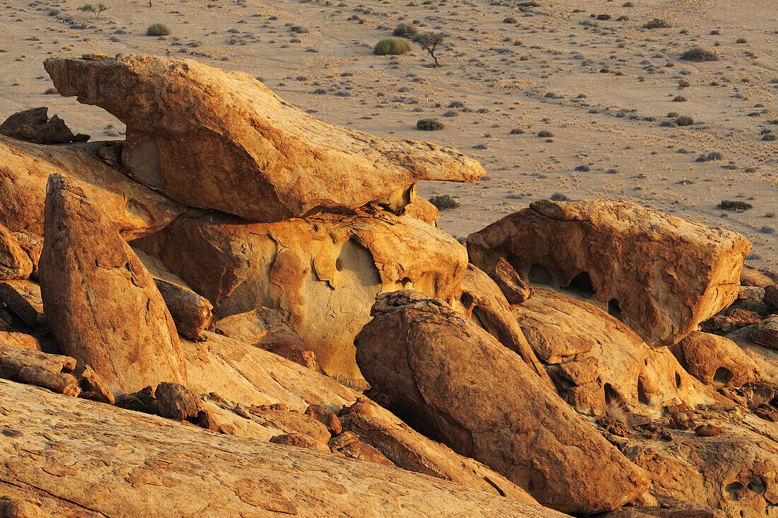 Bizarre rock above savannah, Blutkoppe, Namib Naukluft National Park, Namib desert, Namib, Namibia