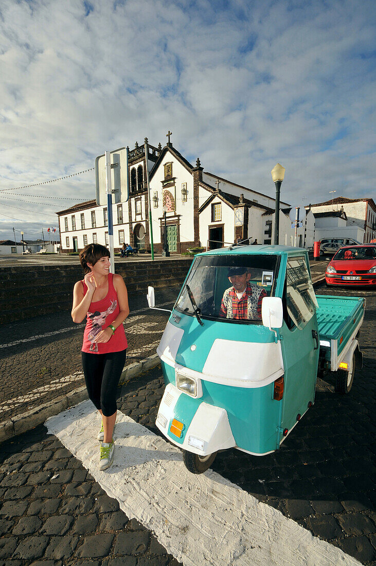 People and Nossa Senhora da Vitoria church at Vila do Porto, Island of Santa Maria, Azores, Portugal, Europe