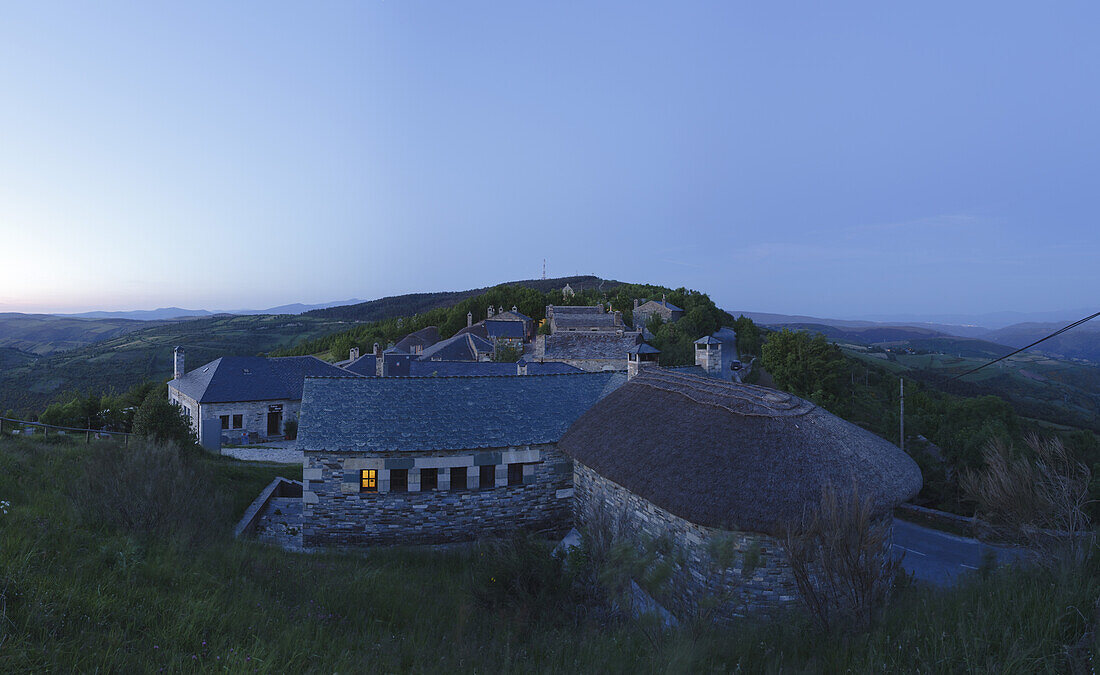 Houses at the village O Cebreiro in the evening, Province of Lugo, Galicia, Northern Spain, Spain, Europe