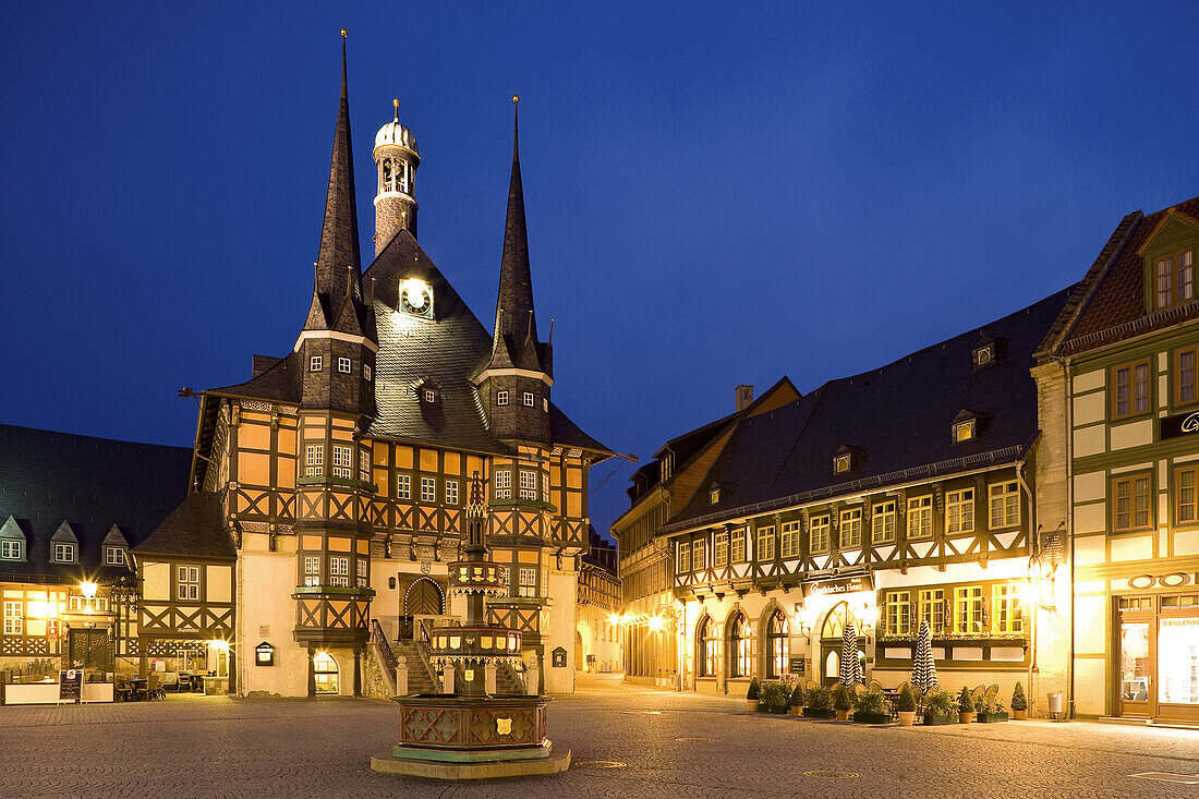 Market square with half timbered houses and town hall at Wernigerode in the evening, Harz mountains, Saxony Anhalt, Germany, Europe