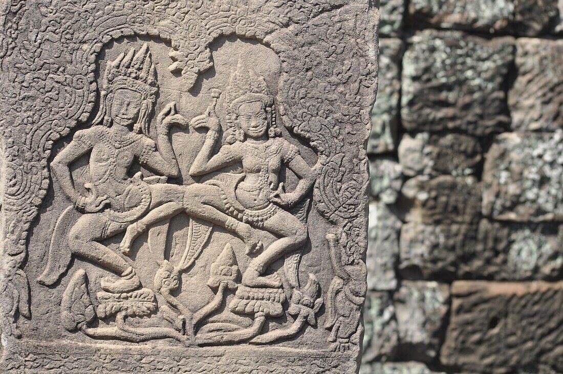 Angkor (Cambodia): carved wall at the Bayon