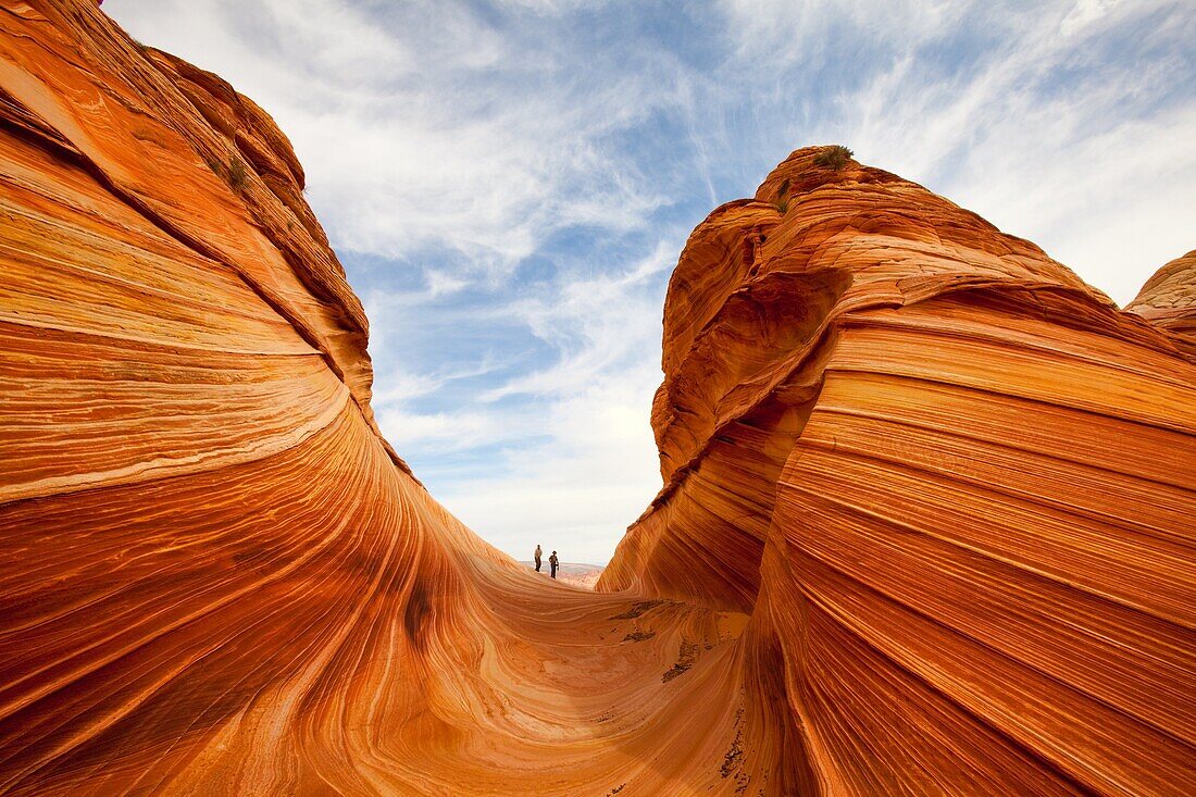 'Vermilion Cliffs Wilderness Area of northern Arizona, USA. The area is called North Coyote Buttes, and this specific rock formation is called the wave''.  The rock is actually petrified sand dunes which has formed striated sandstone.'''