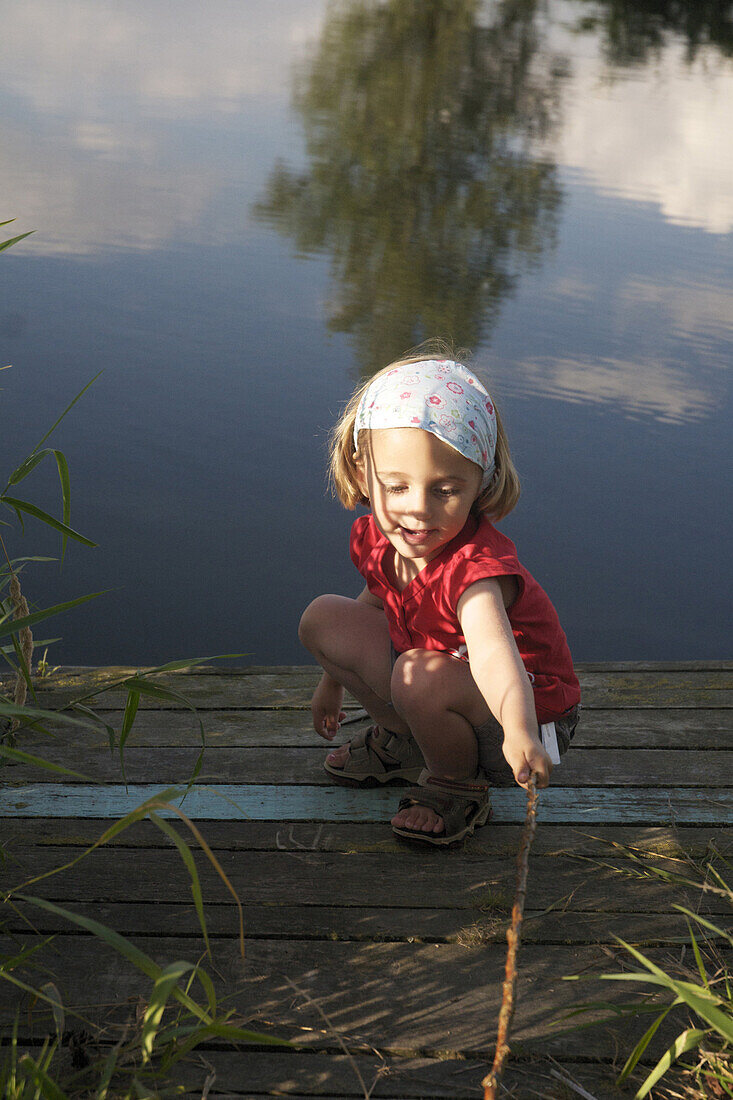 Little Girl Playing On The Banks The River, Somme (80), Picardy, France