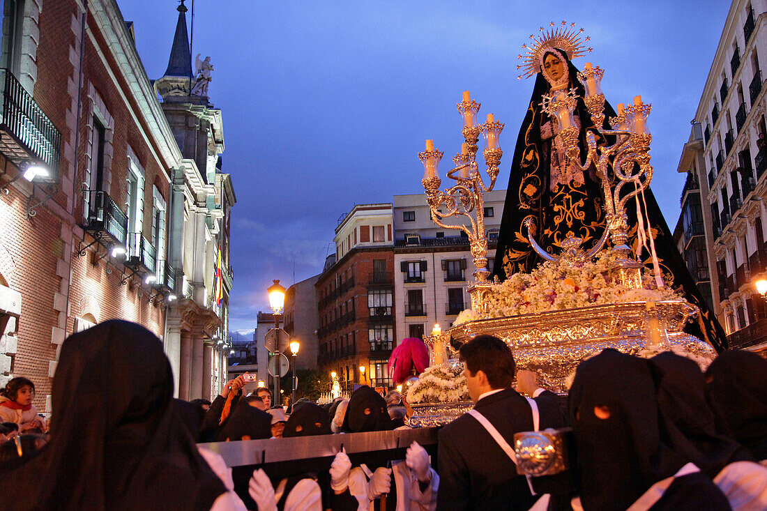 Penitents Carrying The Statue Of The Virgin Mary On A Shield Decorated With Flowers, Procession Of The Brotherhood Of Nuestra Senora De Los Dolores (Our Lady Of Sorrows), Plaza Mayor, Madrid, Spain