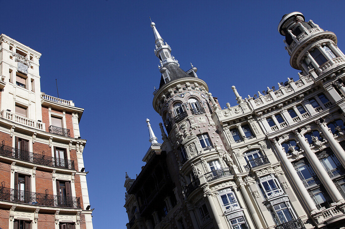 Sculpted Facade Of A Building On The Round Square, Plaza De Canalejas, Madrid, Spain