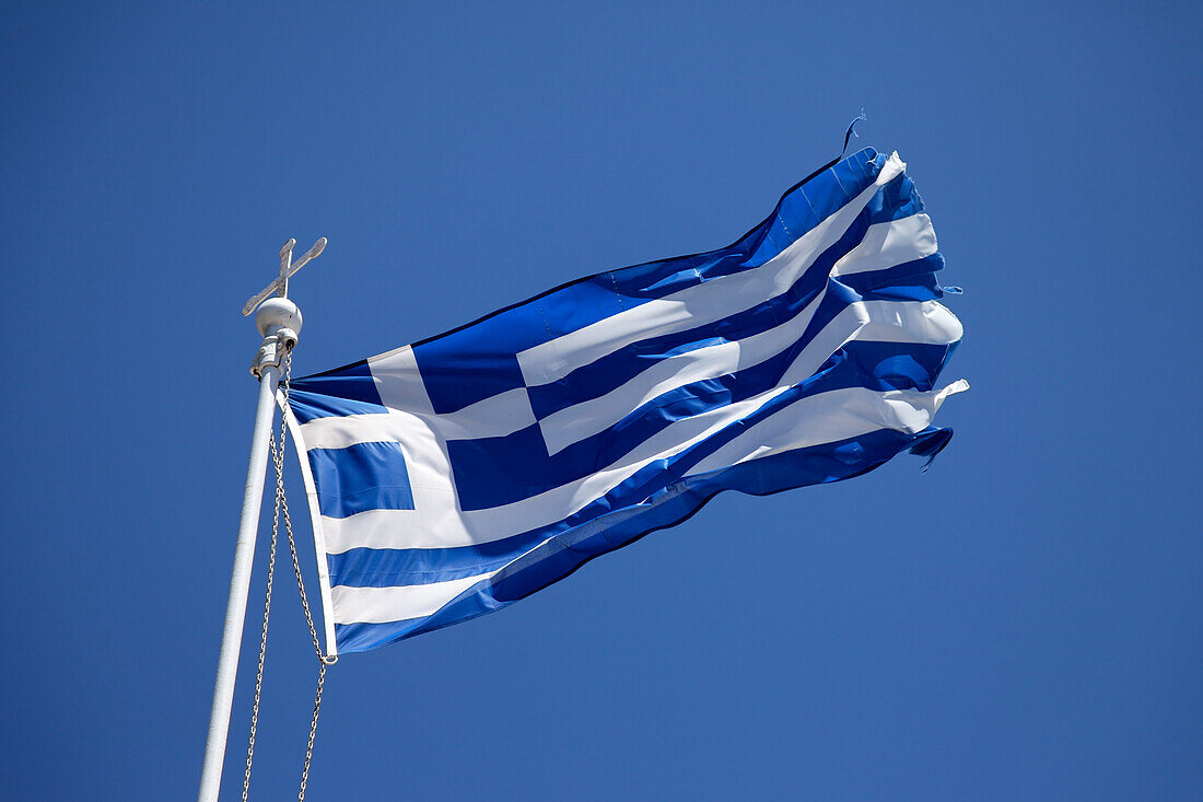 Greek flag in the wind, Crete, Greece